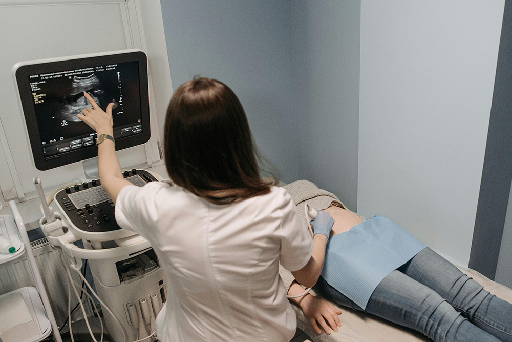 Medical professional performing ultrasound scan